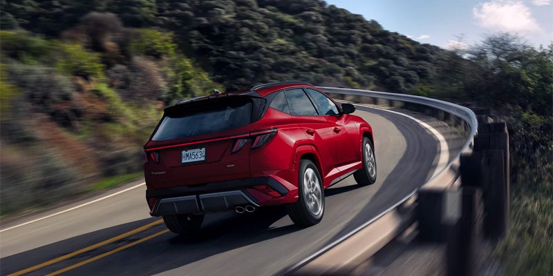Hyundai Tucson red running